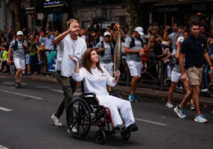 Lebanese photojournalist, wounded in Israeli strike, carries Olympic torch to honor journalists
