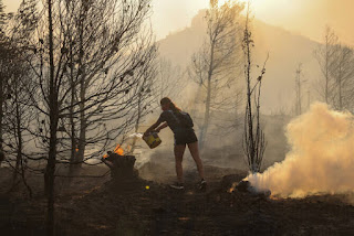 Greece deploys firefighters, planes and helicopters to fight fire on Evia Island